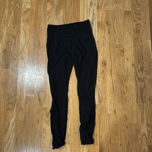 black athleta leggings with cool side detail